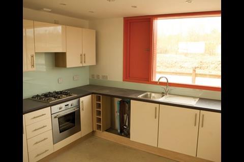 kitchen, showing the openable wall panel to the left side of the window.
